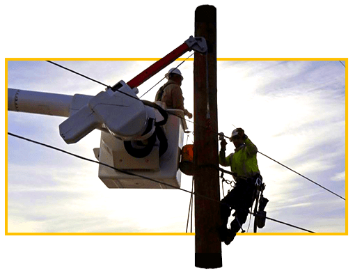 two workers begin restoration process on electrical pole