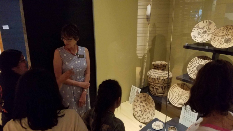 GRICUA youth observing tribal pottery